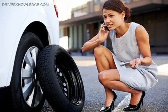 change a flat tire