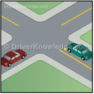 two vehicles arrive at an uncontrolled intersection same time